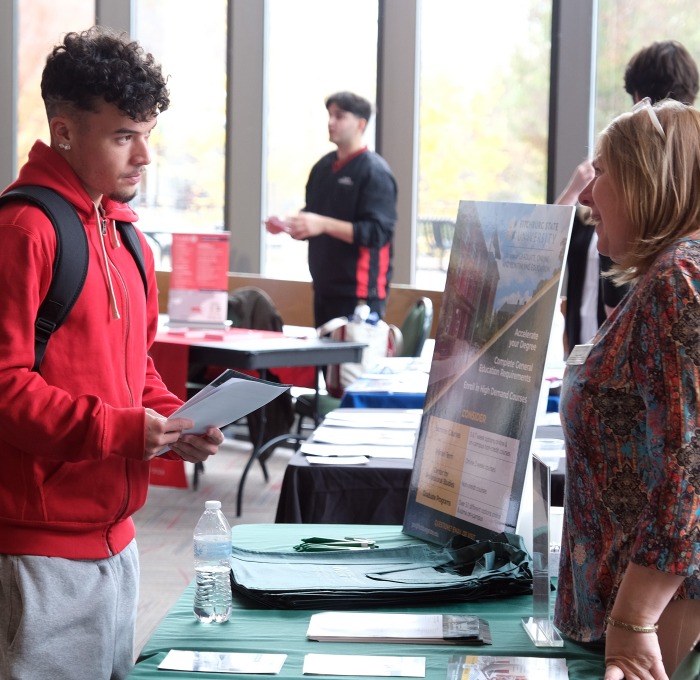 SGOCE and student at the Graduate Fair in Hammond Hall Main Lounge