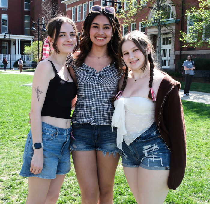 Girls on quad in shorts in summer.