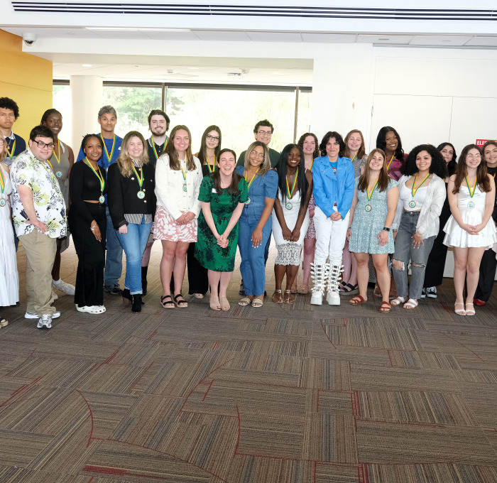 Group of study abroad students 2024 in Hammond Main Lounge.