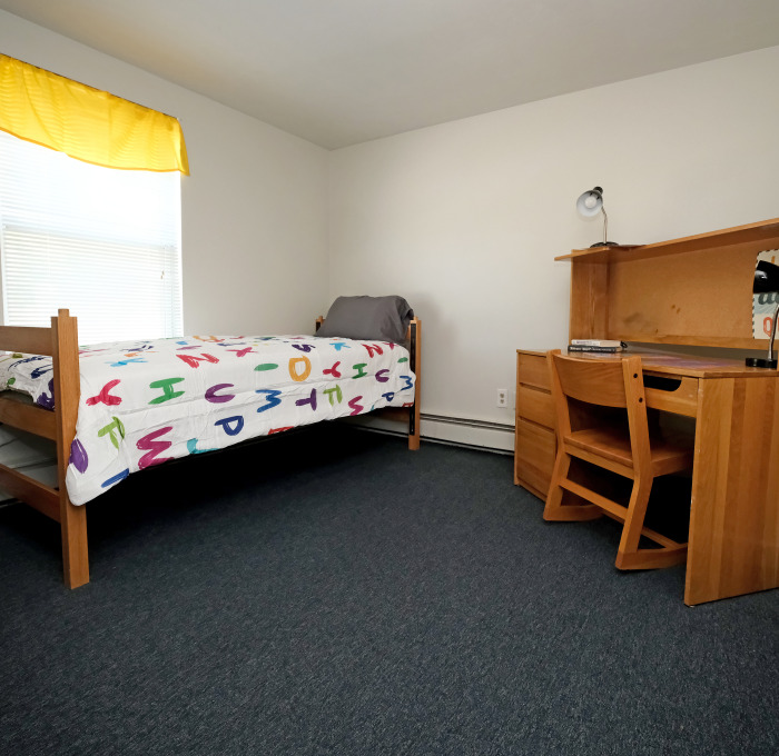 A bedroom in the family housing unit