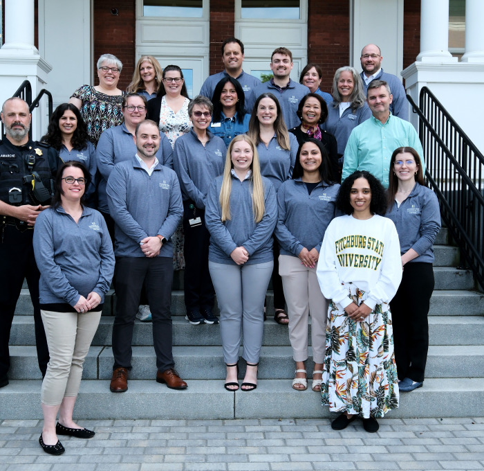 Members of the CARE team on steps of Thompson Hall.