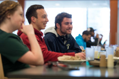 smiling students in the cafeteria 