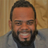 Headshot of Christopher Medley, Director of Housing