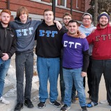 Conlon Hickey and Sigma Tau Gamma brothers in front of Edgerly Hall