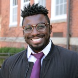 David Demosthenes '17 on quad in front of Edgerly Hall