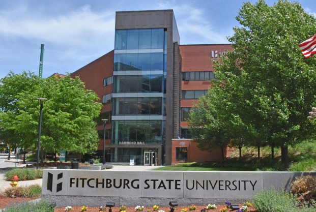 Front view of Hammond Hall with Fitchburg State University sign.