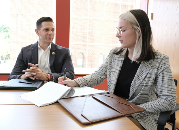 State Rep Michael Kushmerek and legislative aide Rebecca Hess at work