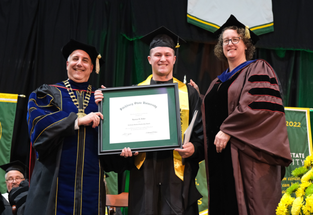 President Lapidus, Graduate Student Leadership Award Recipient Spencer Fuller, and Provost Patricia Marshall