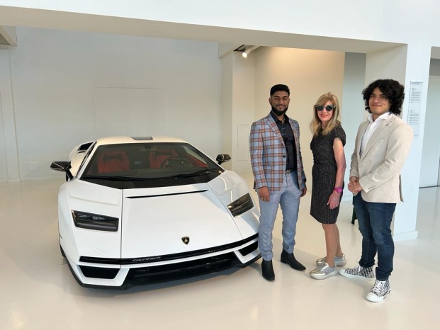 Picture of students with Lamborghini on trip to Milan, Italy