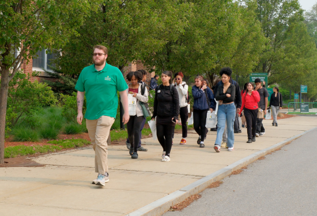 Tour guide Cole Brunker leading visitors