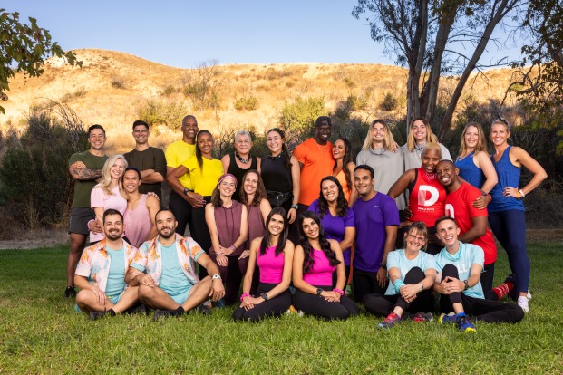 Group photo of Amazing Race cast with alum Mary Cardona-Foster