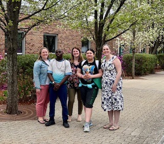 MAICEI students with teachers in front of Sanders