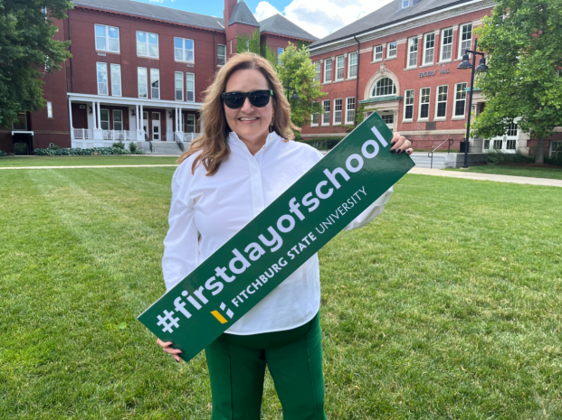 President Hodge with a first day of school banner