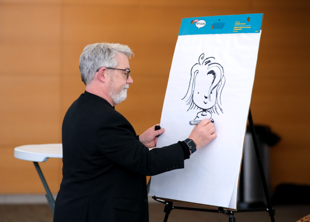 Peter H Reynolds drawing on paper in Hammond Hall appearance