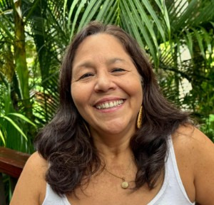 Headshot of María Berríos CPS instructor outside in summer.