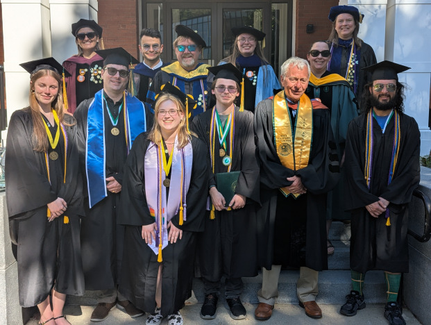 Math Graduates in Regalia May 2026 with Faculty.