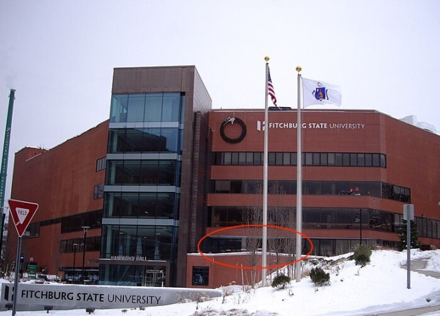 Front view of Hammond Hall in winter with G lobby entrance circled.