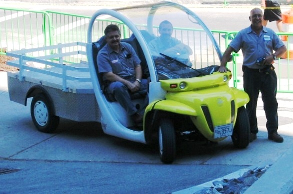 Housing maintenance staff in a cart