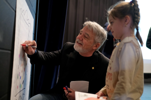 Peter H. Reynolds '83 and McKay Elementary student March 2025