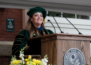 President Hodge speaks at podium during undergraduate commencement May 2025