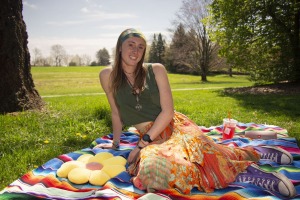 Skye Goba outside on blanket