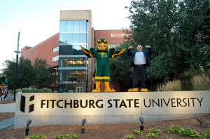 Jason Polonsky created Falcor and stands in front of Hammond with the new Freddy mascot
