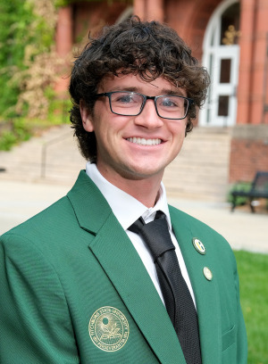 Matthew Gill headshot outside in front of Thompson Hall. 