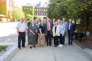 Jim Walsh Alumni Service Award winner with family