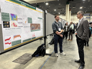 Student Ethan Chaco presenting his poster at the AGU Conference in New Orleans.