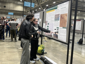 Student Sara Beaulac presenting poster at AGU Conference