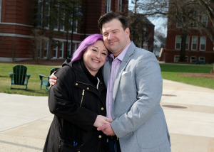 Adam Nadeau master's degree with wife Robin on campus