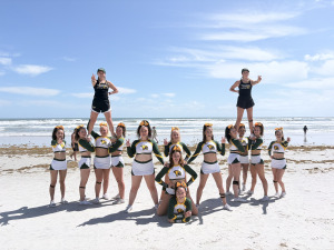 Cheerleading squad on the beach in Florida top 10 finish at Nationals