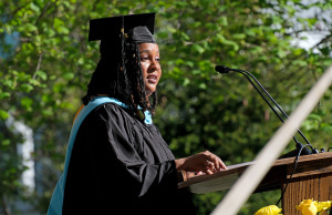 Jossara Dos Santos Dias speaks at the graduate commencement