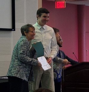 Beth Swartz and Aidan Thompson at Alpha Alpha Alpha Induction Ceremony.