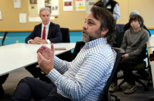 Kyle Moody talking in the classroom Worcester District Attorney Joe Early in background.