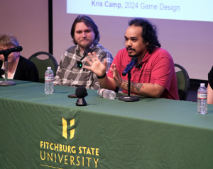 Kris Camp and other alumni at a panel discussion.