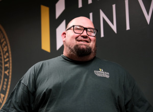 Nathan Fisher smiles while talking about his new book