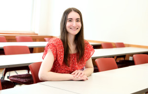 Alyssa Tata a new teacher sits at desk