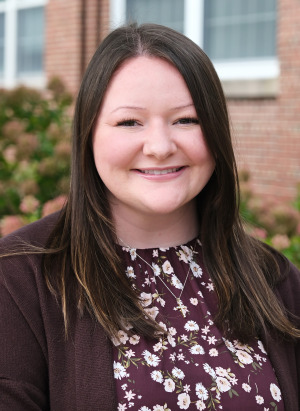 Gabrielle Adams from Admissions headshot outside.