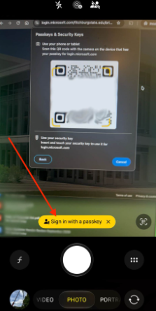 Screenshot of camera with QR code for Passkey.
