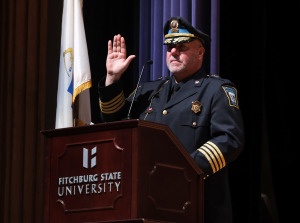Police Chief Michael Cloutier during 9th ROC graduation at podium