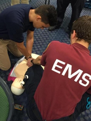 Students practicing CPR on a dummy