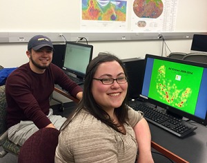 Kayla Kress and Samuel Gallagher working at computers
