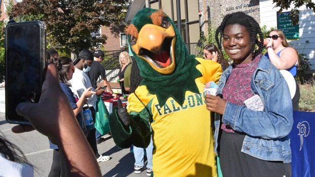 Freddy the Falcon and Student in front of Mazzaferro